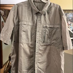 Gramicci men’s button down casual shirt. 2 front pockets and zipper pocket